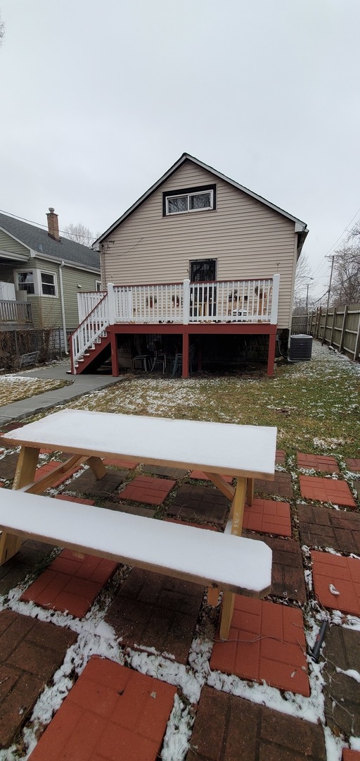 9315 South Clyde Avenue Chicago, IL 60617 - Photo 29 of 32 a view of a house with a yard