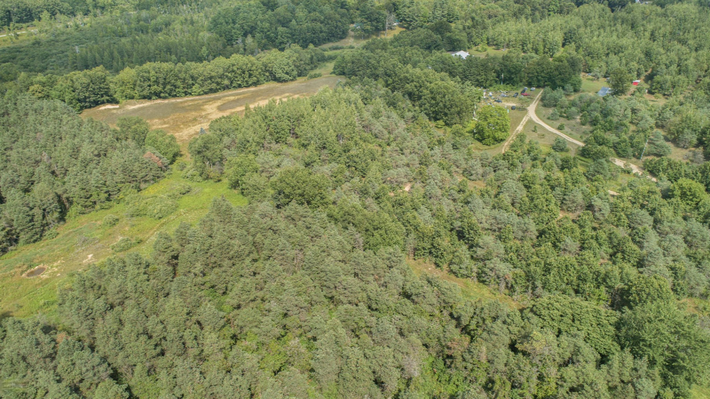 3409 Evergreen Road Southeast, Unit 3 Stanton, MI 48888 - Photo 11 of 25 DJI_0225