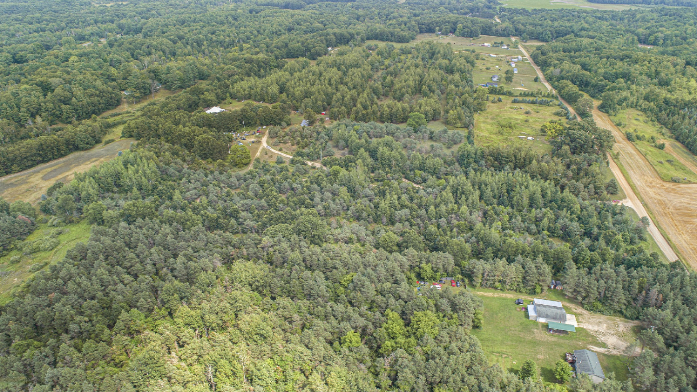 3409 Evergreen Road Southeast, Unit 3 Stanton, MI 48888 - Photo 5 of 25 DJI_0217