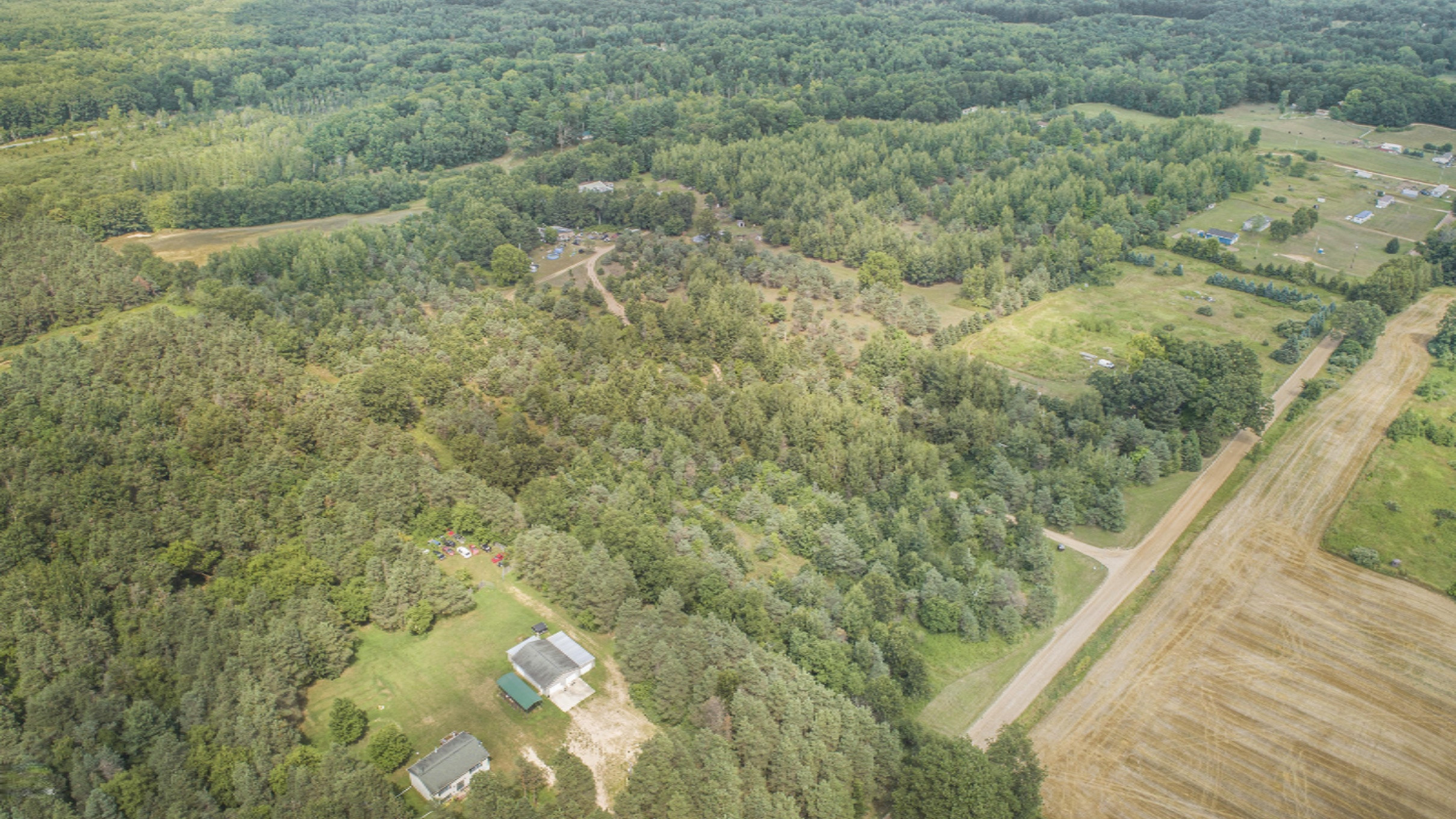 3409 Evergreen Road Southeast, Unit 3 Stanton, MI 48888 - Photo 6 of 25 DJI_0218
