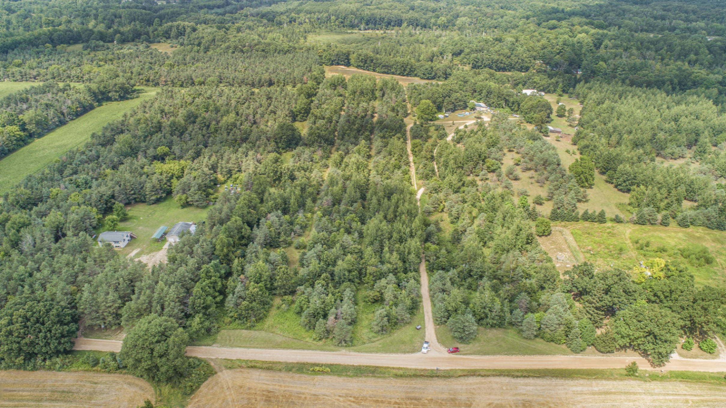 3409 Evergreen Road Southeast, Unit 3 Stanton, MI 48888 - Photo 7 of 25 DJI_0219