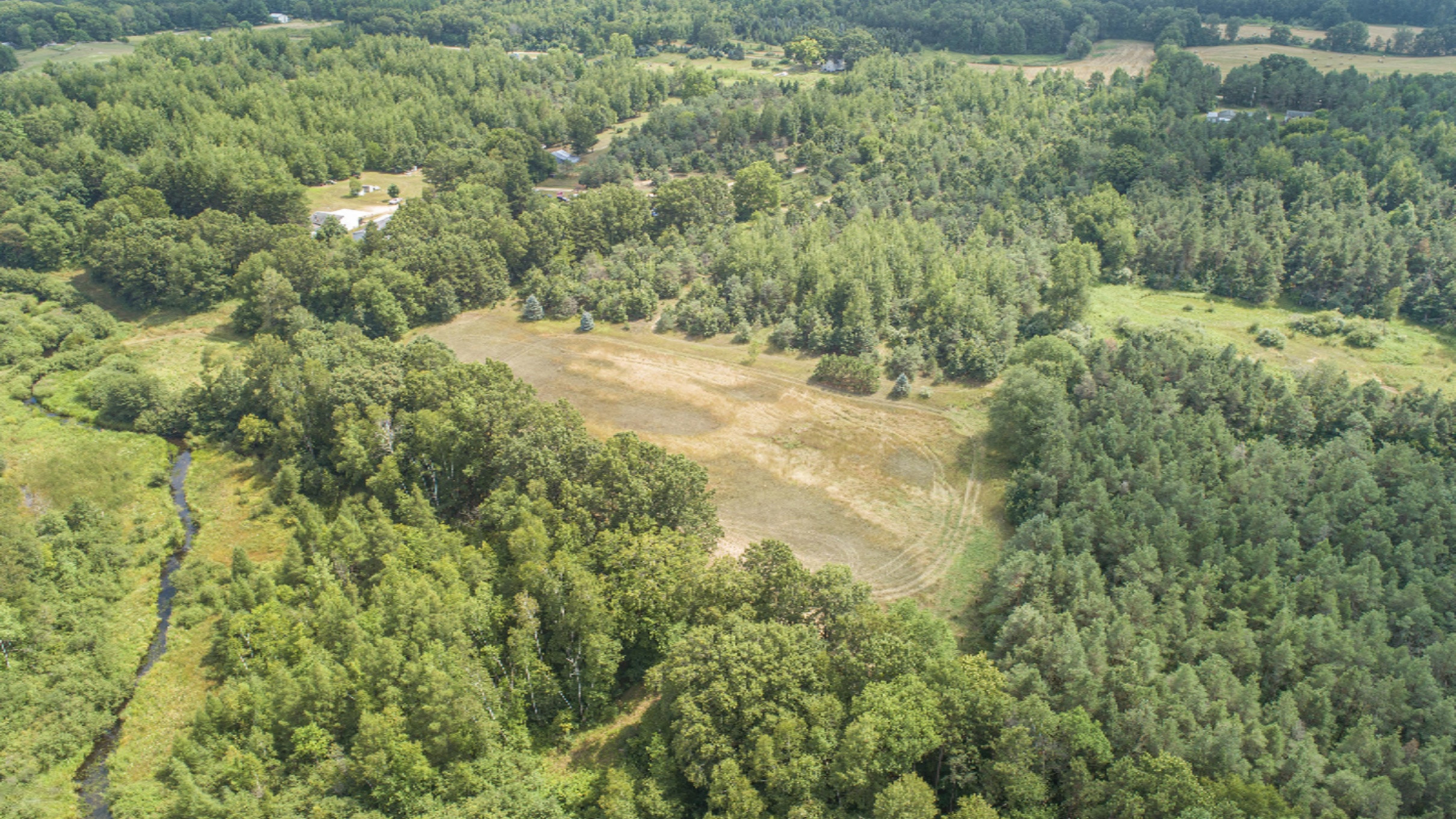 3409 Evergreen Road Southeast, Unit 3 Stanton, MI 48888 - Photo 9 of 25 DJI_0223