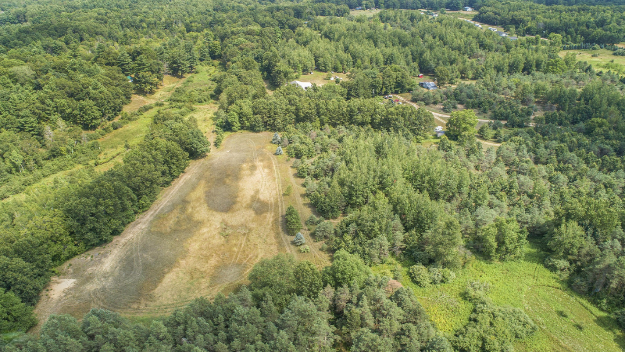 3409 Evergreen Road Southeast, Unit 3 Stanton, MI 48888 - Photo 10 of 25 DJI_0224