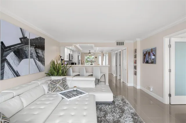 a kitchen with a sink stove and refrigerator