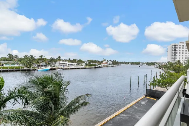 a view of balcony with furniture