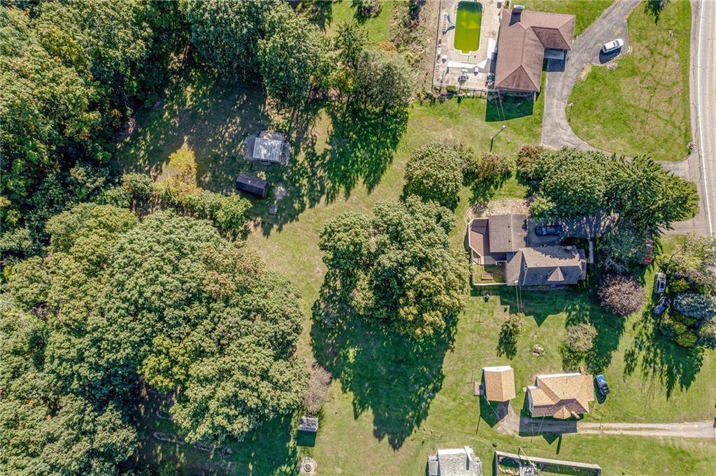 456 Chicora Road Butler, PA 16001 - Photo 35 of 36 an aerial view of a house with a yard and lake view