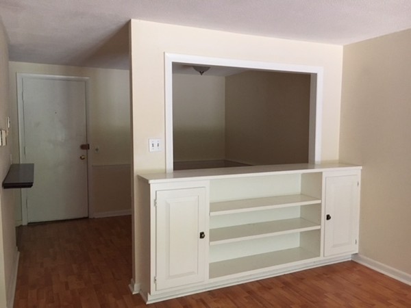 80 Leonard Road, Unit 80 Boxborough, MA 01719 - Photo 3 of 6 a view of walk in closet with empty racks