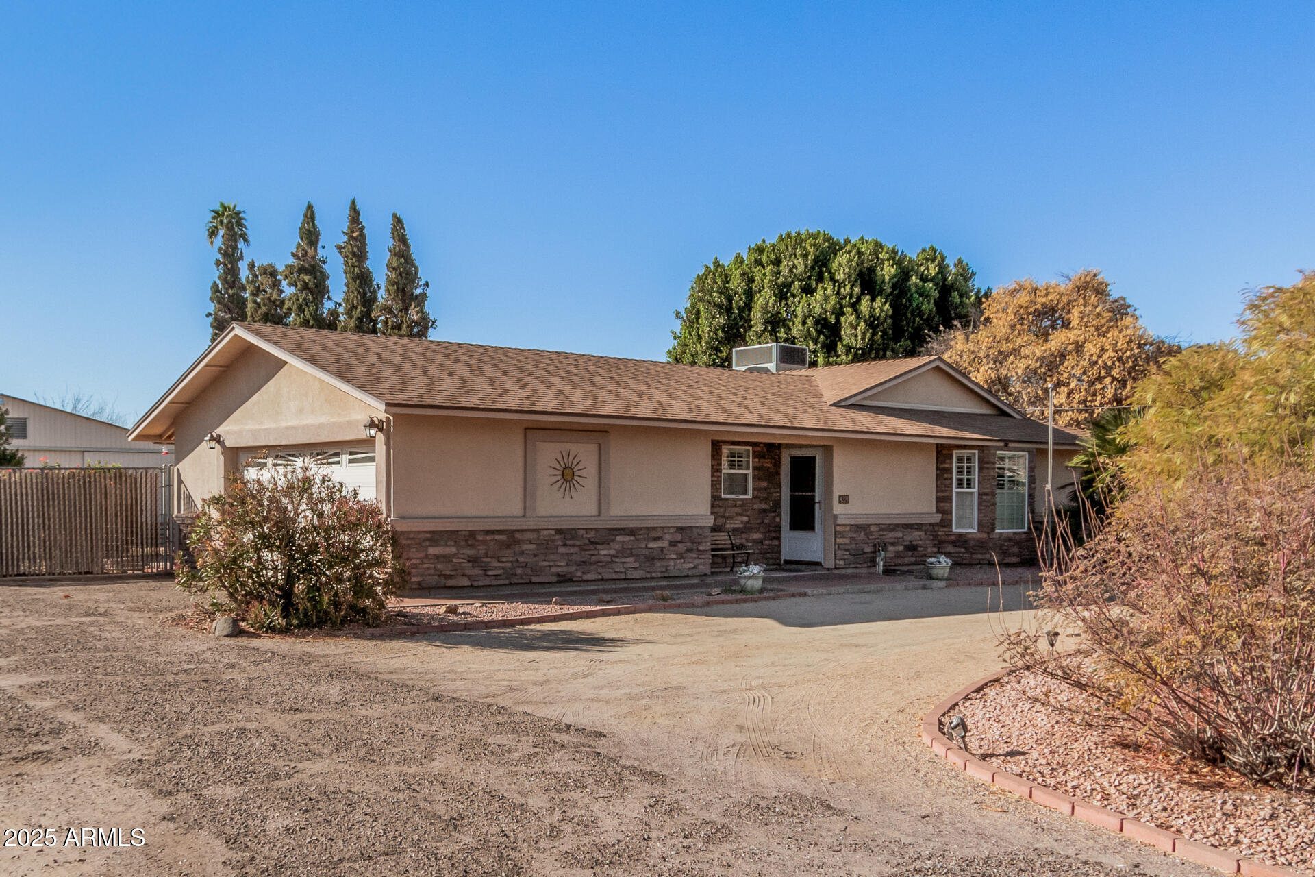 4321 West Greenway Road Glendale, AZ 85306 - Photo 12 of 39 a front view of a house with a yard