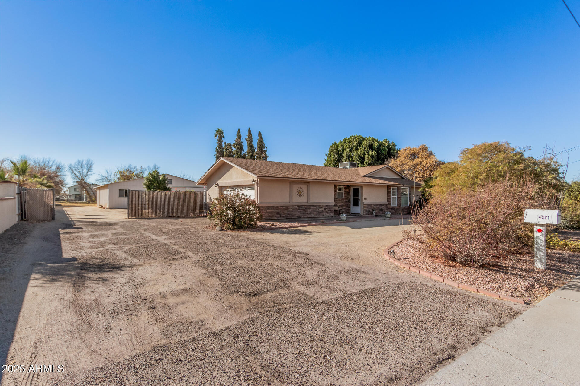 4321 West Greenway Road Glendale, AZ 85306 - Photo 13 of 39 a view of a house with a yard