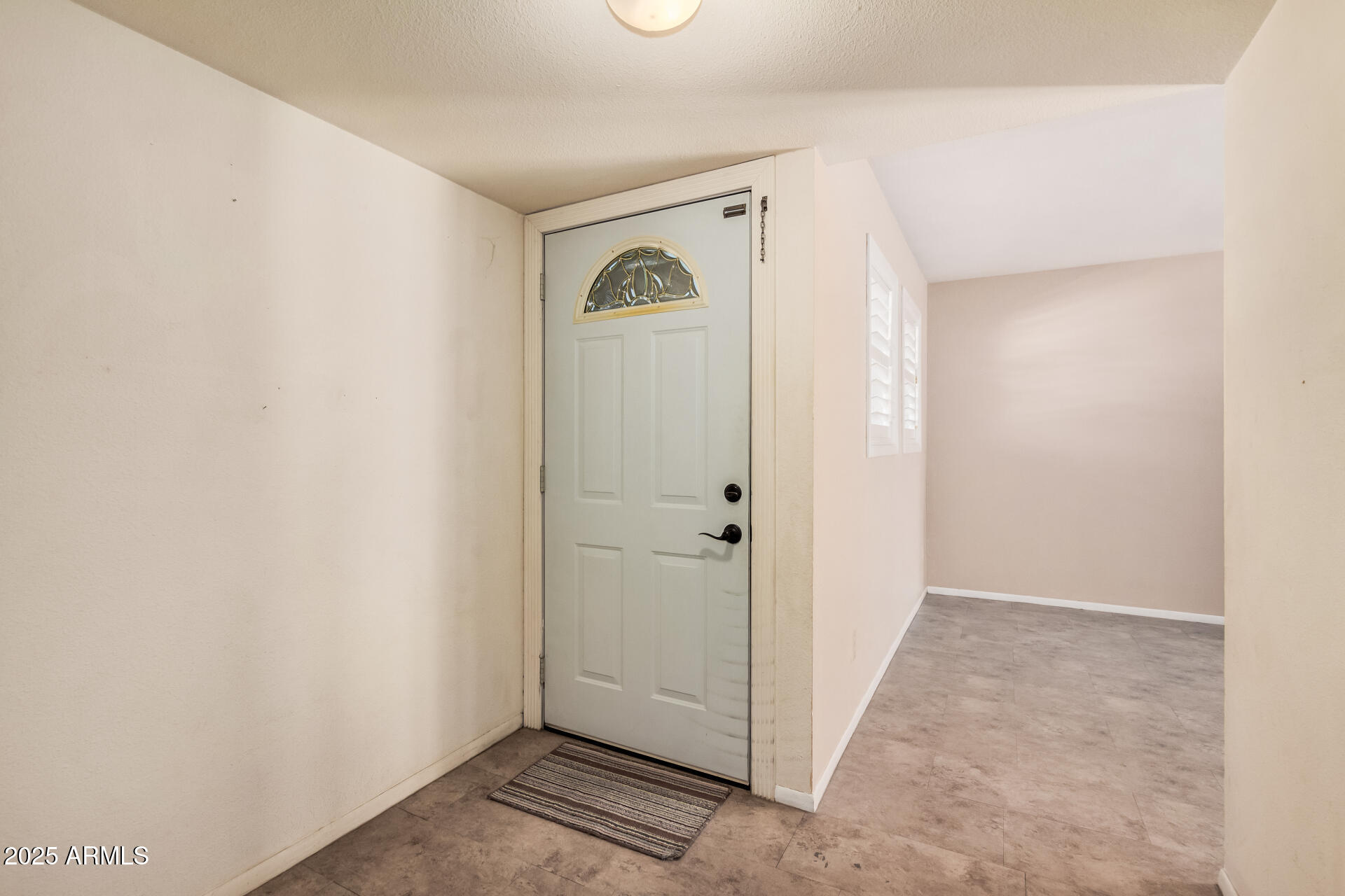 4321 West Greenway Road Glendale, AZ 85306 - Photo 15 of 39 a view of a hallway with closet