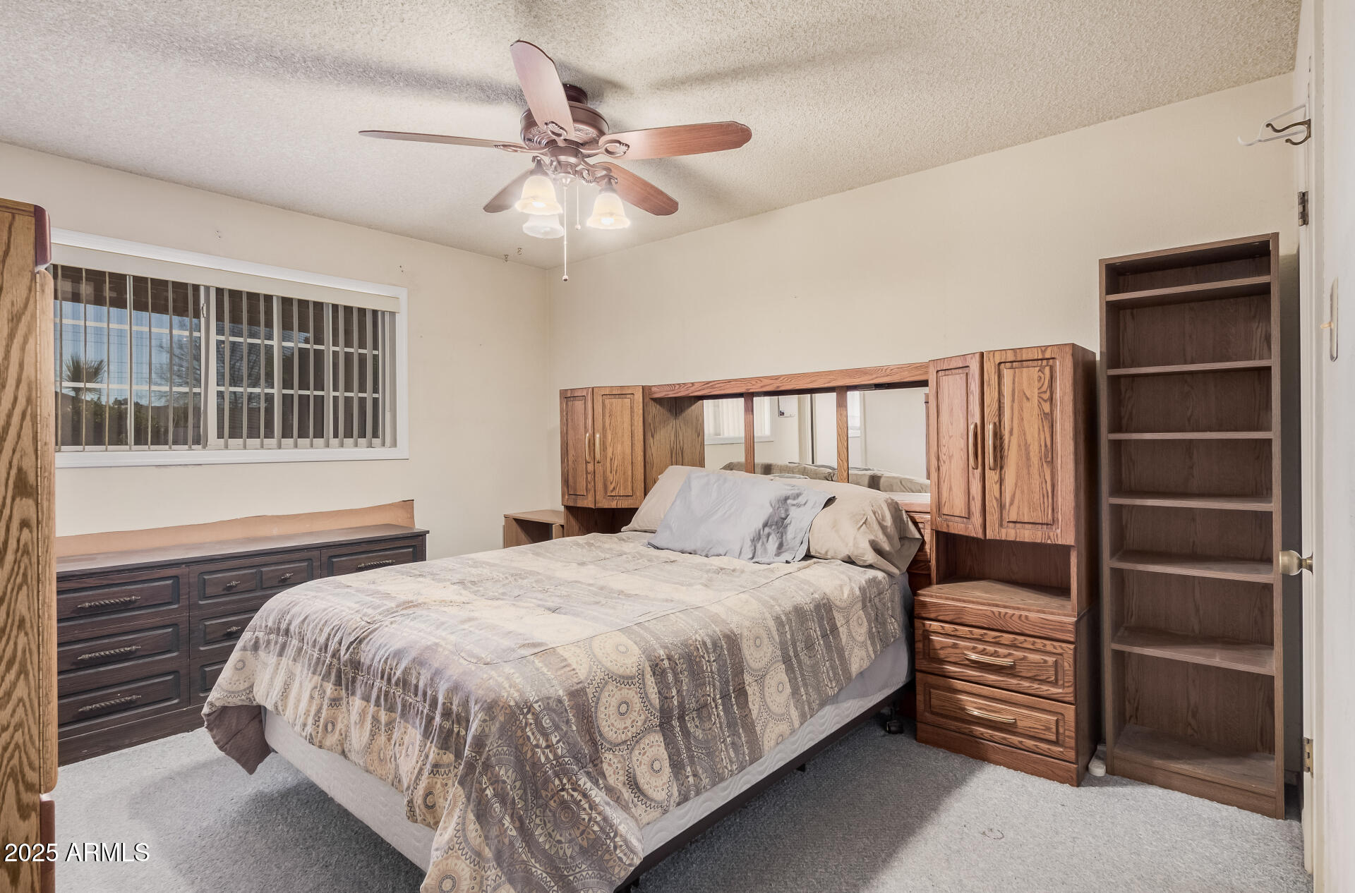 4321 West Greenway Road Glendale, AZ 85306 - Photo 25 of 39 a bedroom with a bed and a window