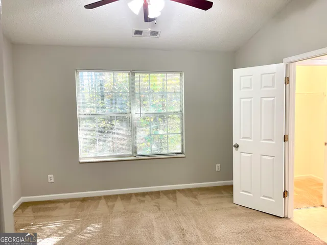 an empty room with windows