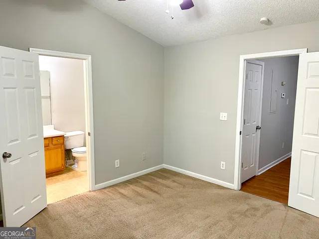 a view of a room with a wardrobe space