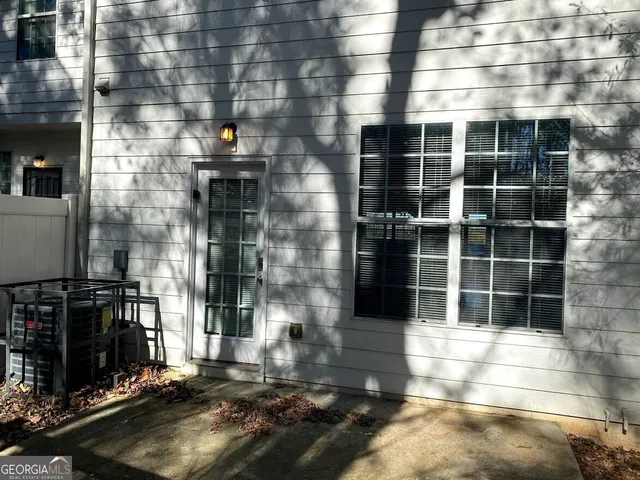 a view of a building with a street