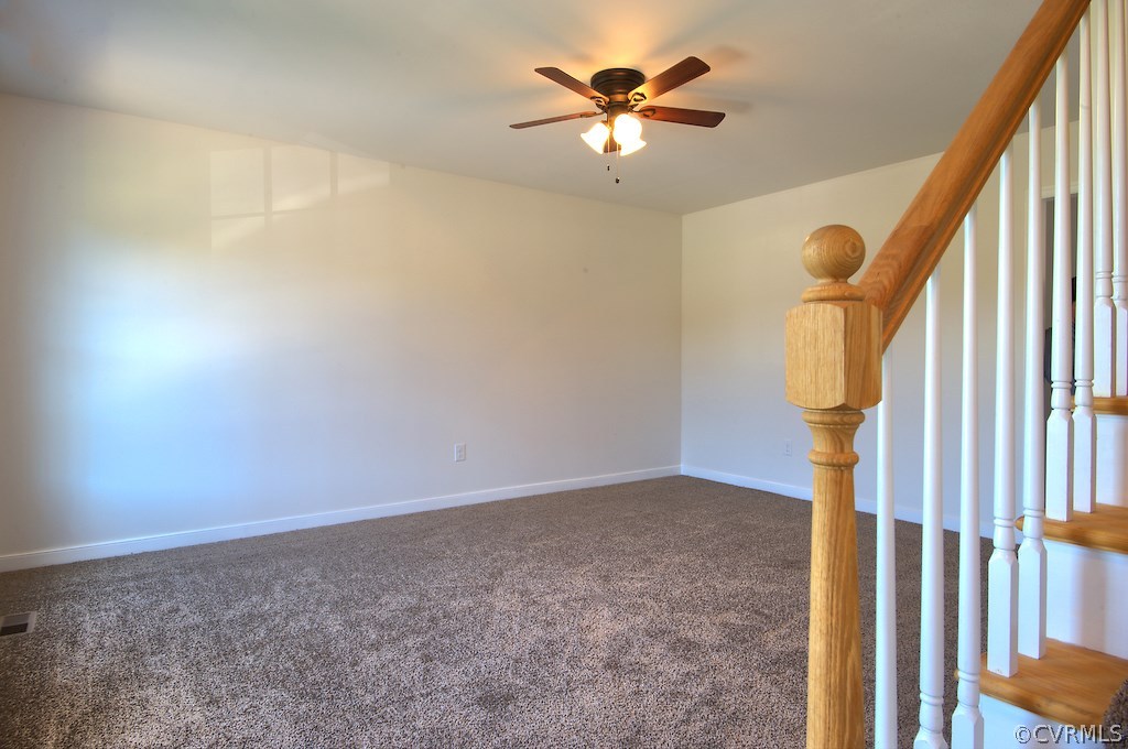 Spacious family room with ceiling fan