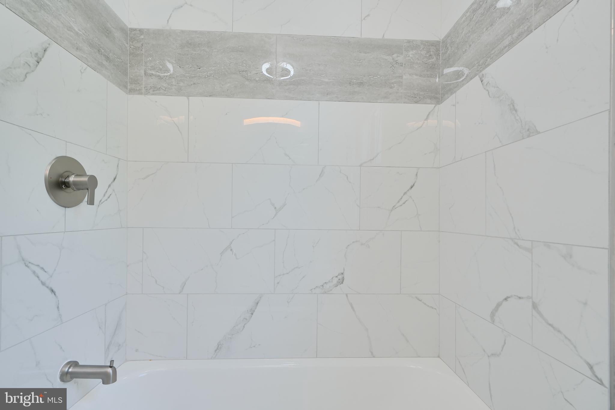 4239 Rokeby Road Baltimore, MD 21229 - Photo 11 of 22 a bathroom with a shower