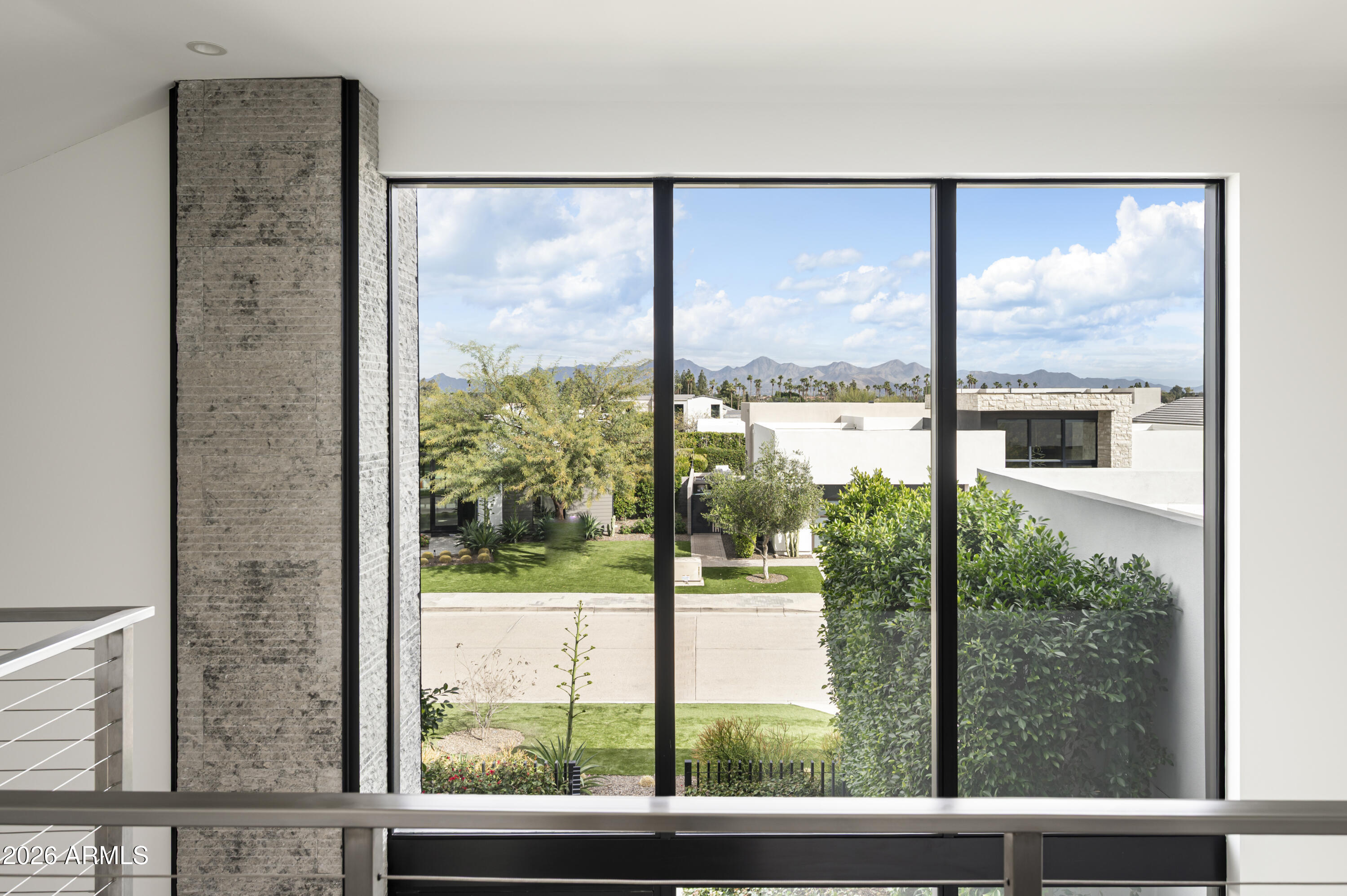 6917 East Cactus Wren Road Paradise Valley, AZ 85253 - Photo 18 of 39 a view of a glass door with a yard from a window