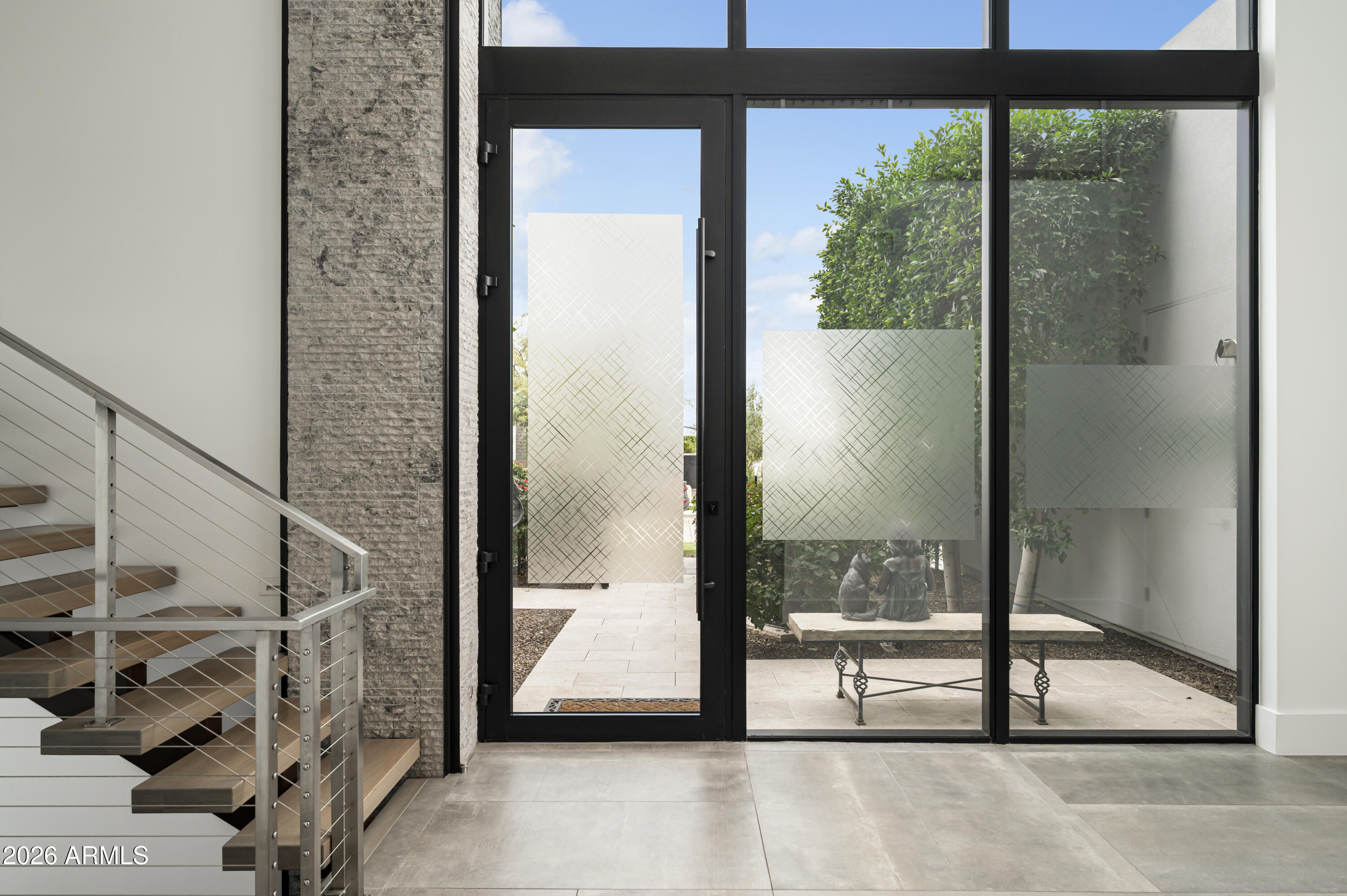 6917 East Cactus Wren Road Paradise Valley, AZ 85253 - Photo 5 of 39 a view of a glass door