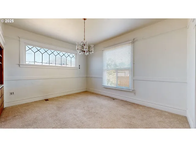 a black and white photo of a room