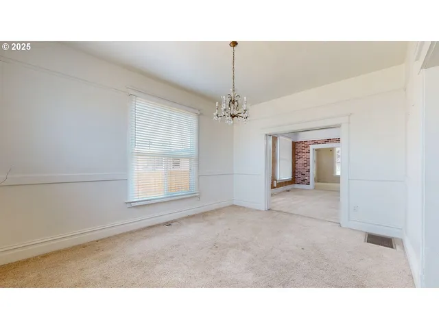 a room with furniture and window