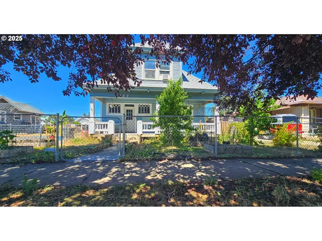 a black and white photo of a house