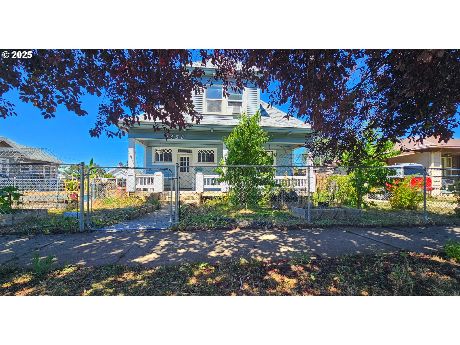2438 Auburn Avenue Baker City, OR 97814 - Photo 2 of 41 a black and white photo of a house