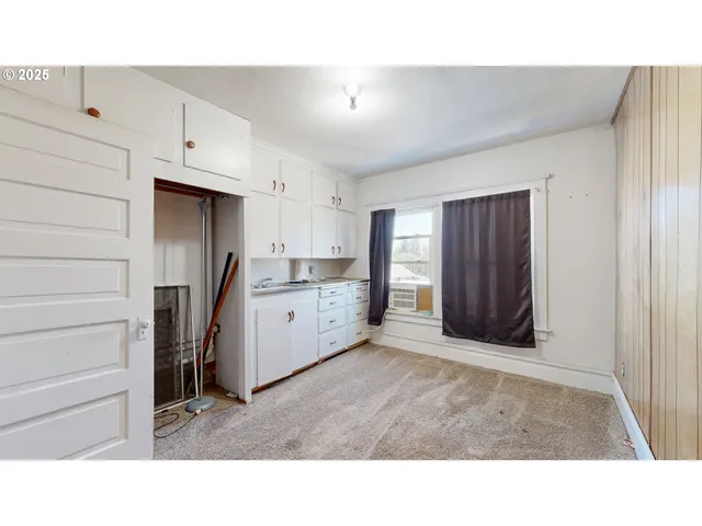 a bathroom with a sink vanity and a mirror