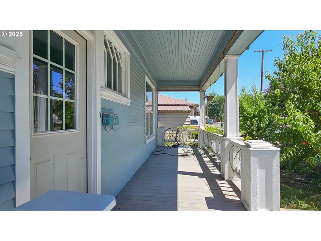 a black and white photo of a house