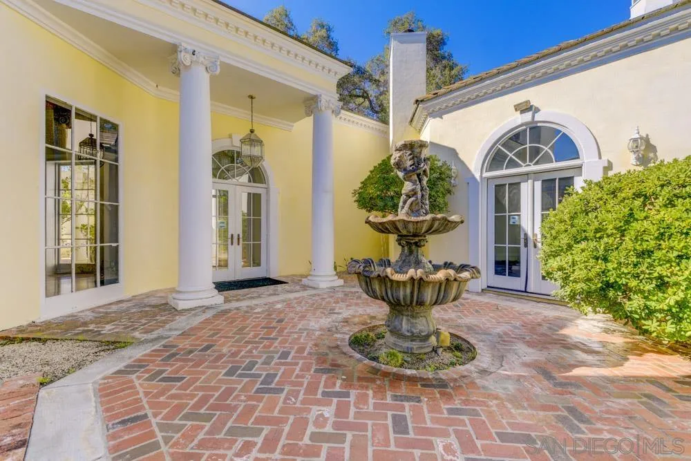 4735 Olive Hill Road Fallbrook, CA 92028 - Photo 11 of 22 a front view of a house with garden