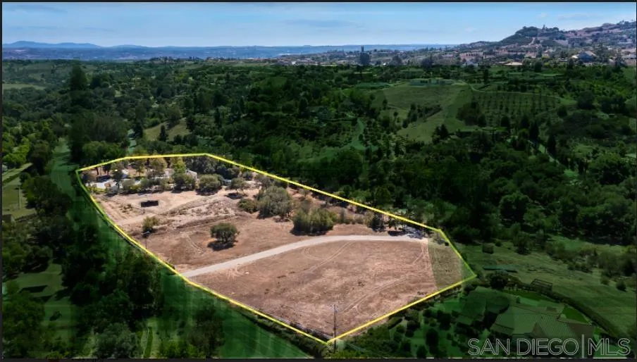 4735 Olive Hill Road Fallbrook, CA 92028 - Photo 4 of 22 an aerial view of a house with a yard and lake view