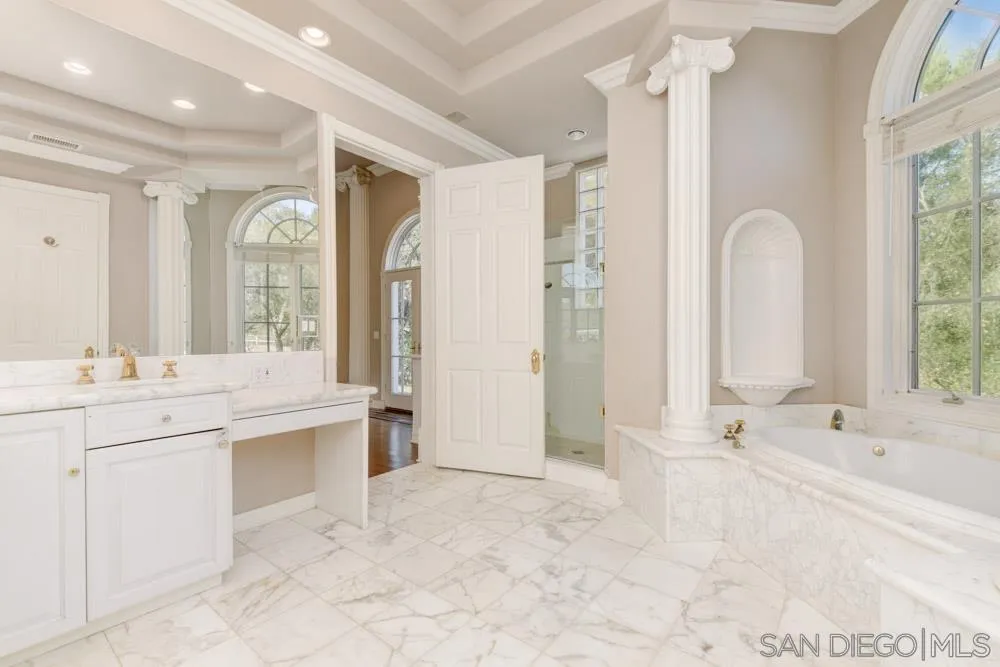4735 Olive Hill Road Fallbrook, CA 92028 - Photo 8 of 22 a large spacious bathroom with a large tub shower and sink
