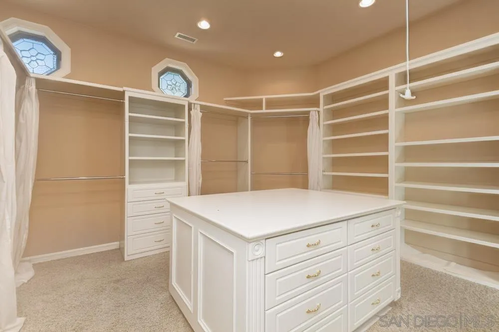 4735 Olive Hill Road Fallbrook, CA 92028 - Photo 9 of 22 a view of an empty walk in closet