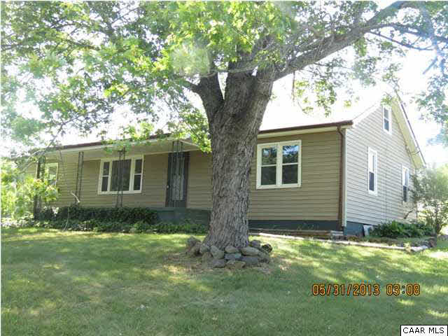 1535 Simms Road Stanardsville, VA 22973 - Photo 1 of 12 a view of house with a yard