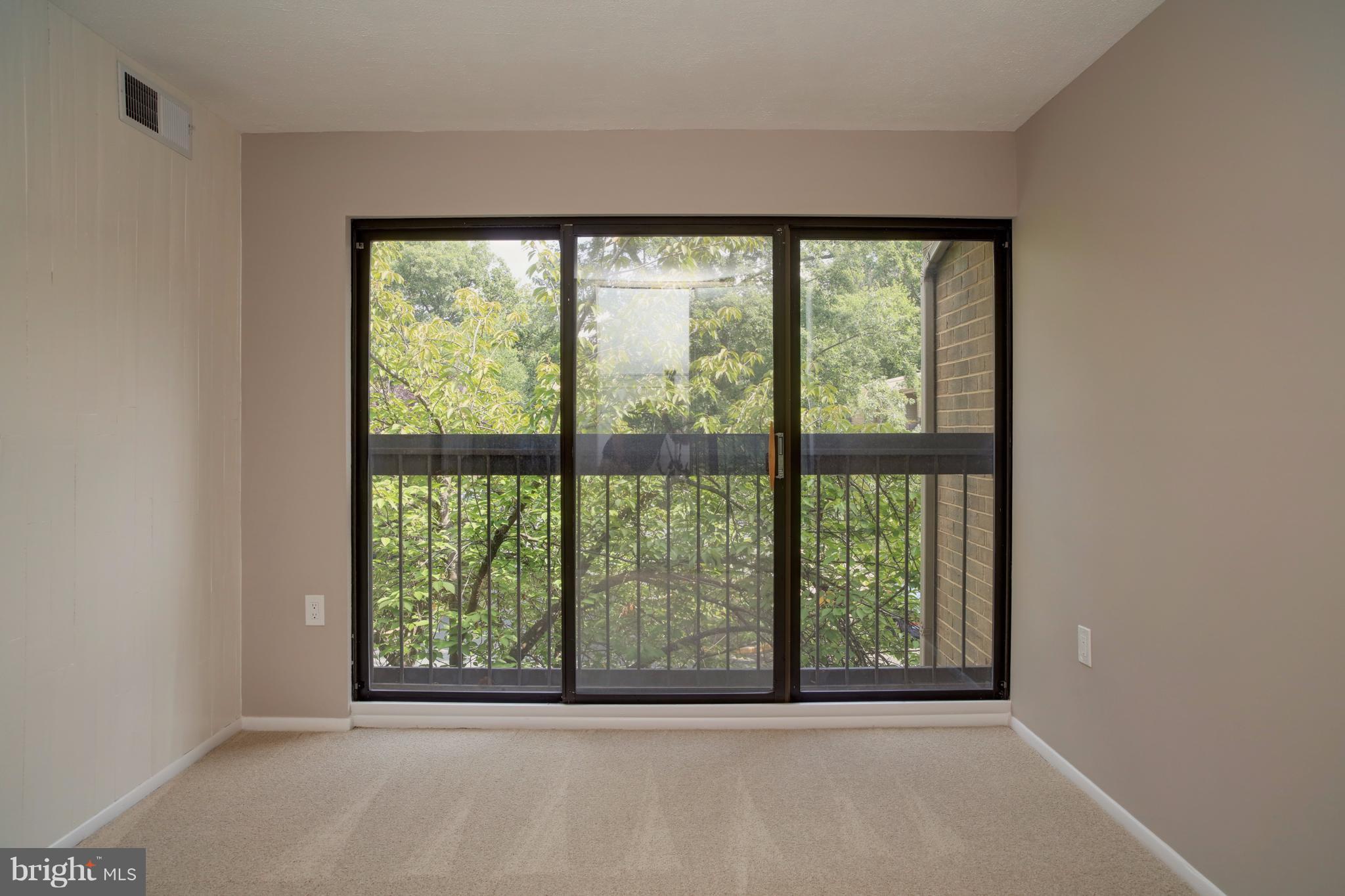11616 Ivystone Court, Unit 301 Reston, VA 20191 - Photo 15 of 29 a view of a room that has a large window