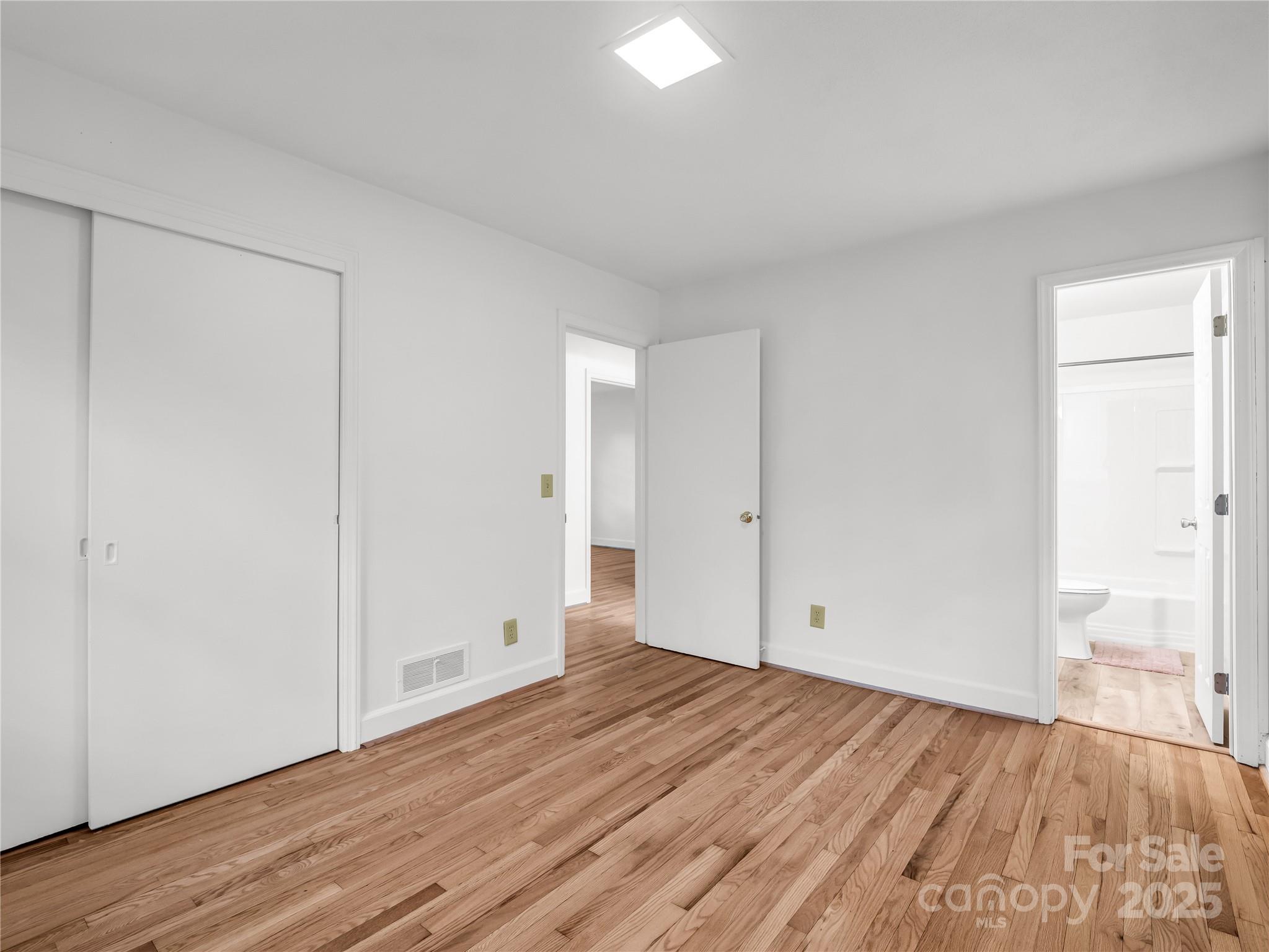 200 Little Wings Mountain Road Columbus, NC 28722 - Photo 15 of 42 a view of room with wooden floor