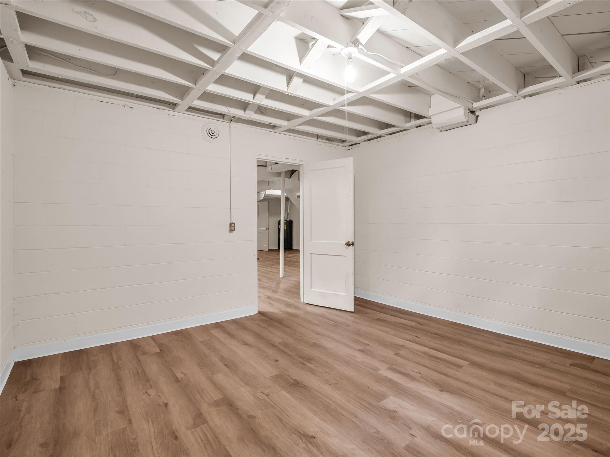 200 Little Wings Mountain Road Columbus, NC 28722 - Photo 25 of 42 a view of empty room with wooden floor