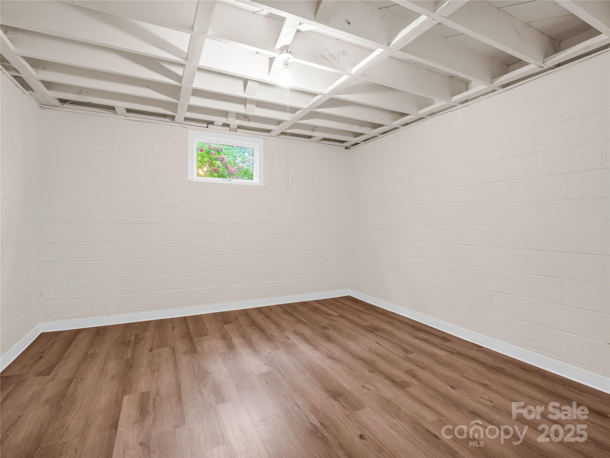 200 Little Wings Mountain Road Columbus, NC 28722 - Photo 28 of 42 a view of a room with wooden floor