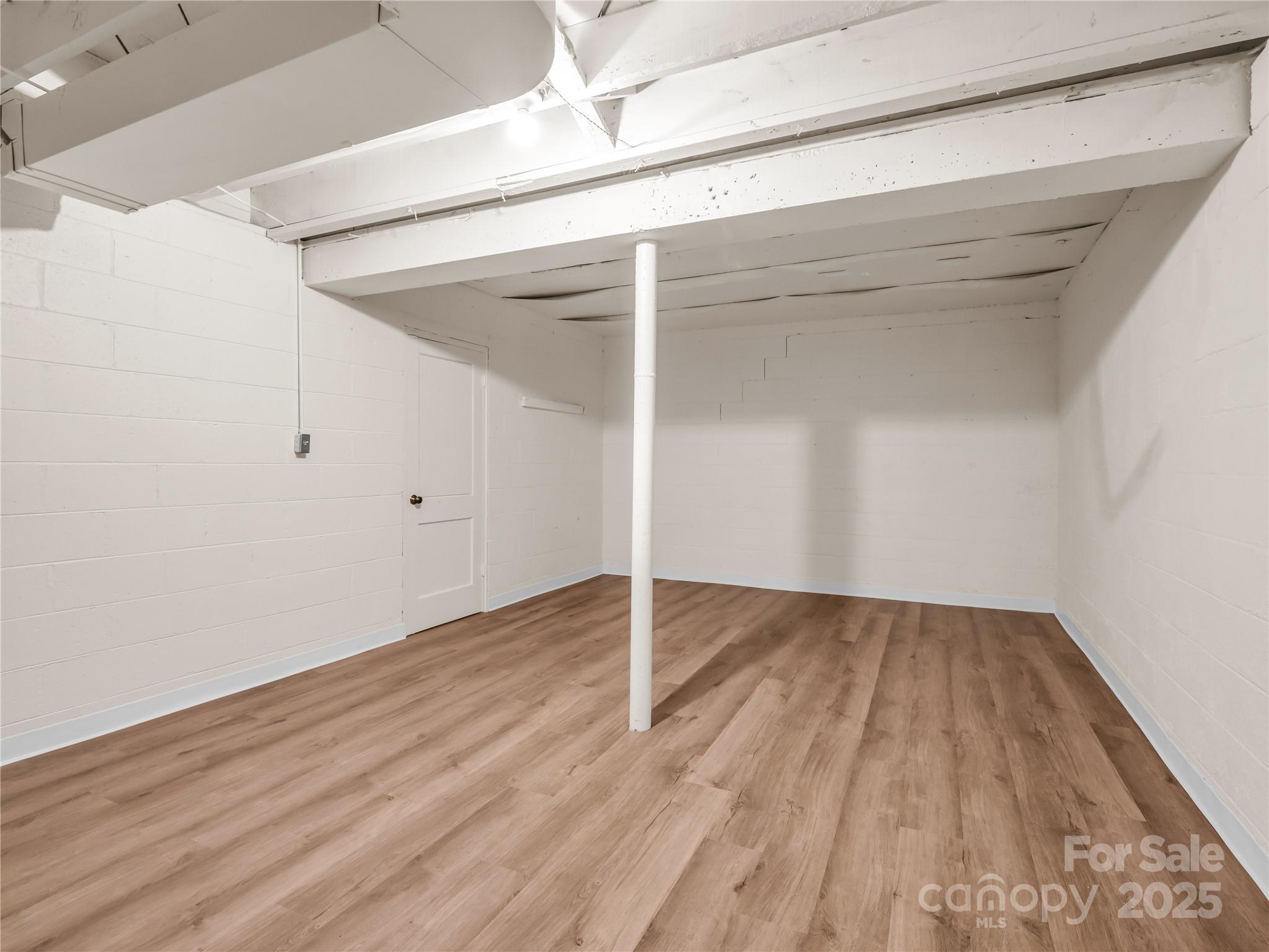 200 Little Wings Mountain Road Columbus, NC 28722 - Photo 30 of 42 a view of a room with wooden floor