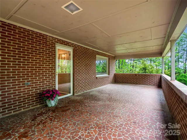 a kitchen with a sink cabinets and window