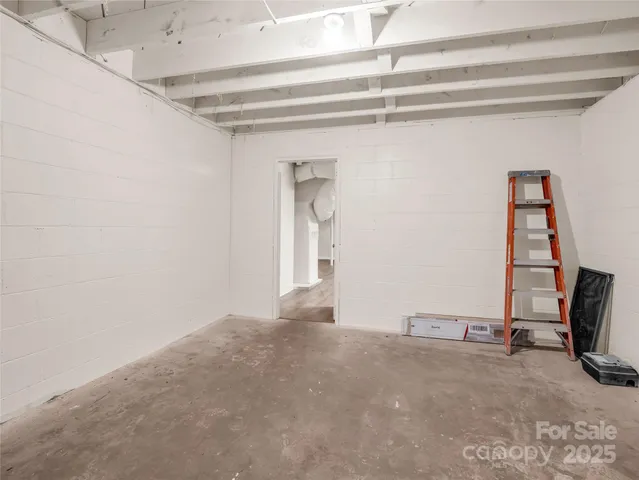 a view of a mountain range with lush green forest