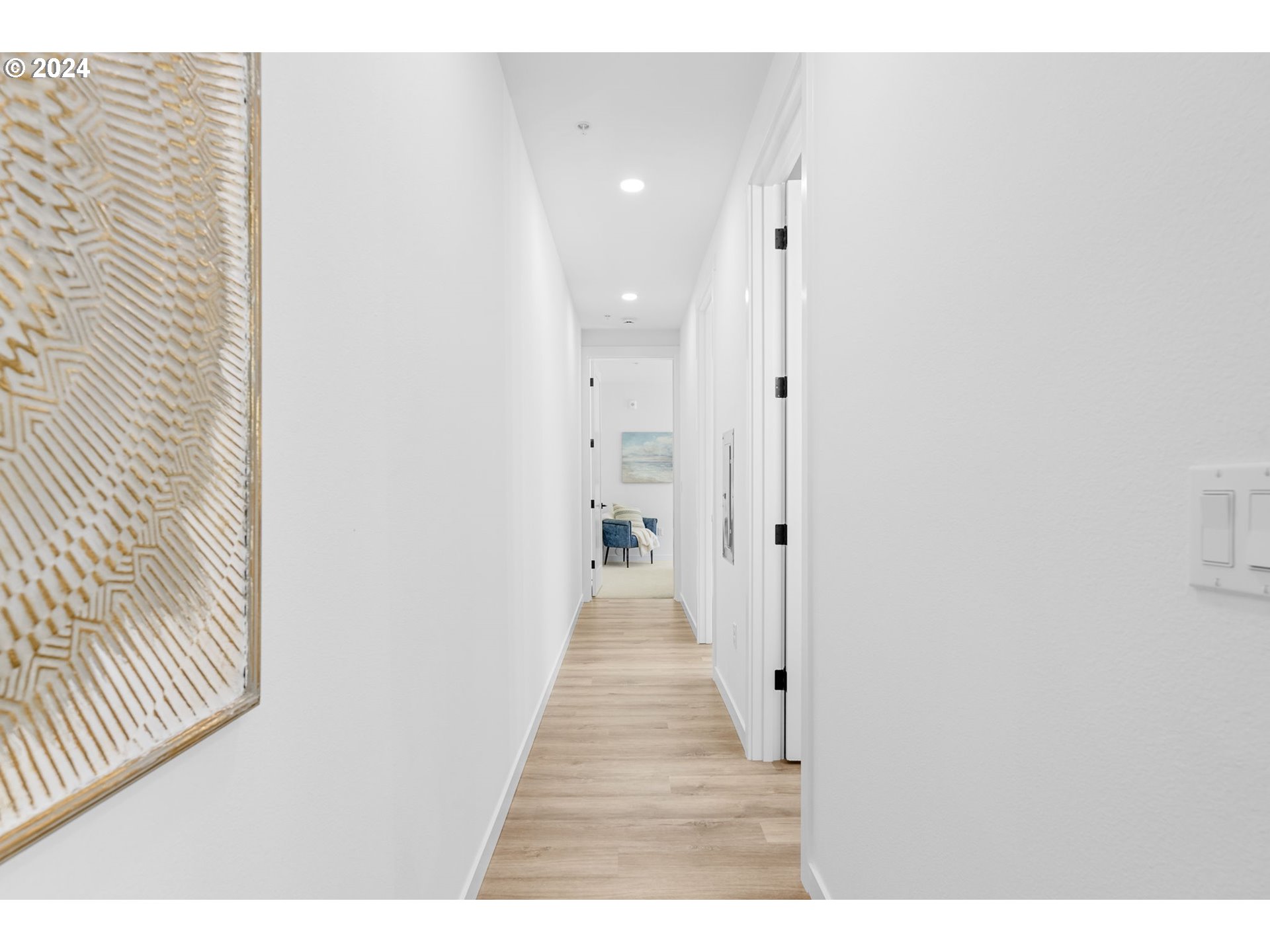 121 North Going Street, Unit 202 Portland, OR 97217 - Photo 12 of 30 a view of a hallway with wooden floor