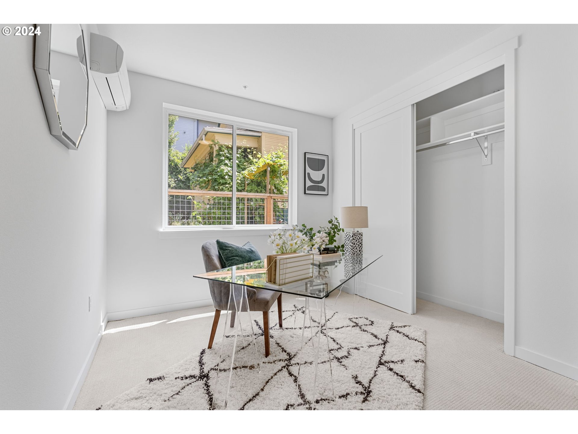121 North Going Street, Unit 202 Portland, OR 97217 - Photo 17 of 30 a work room with furniture and a window