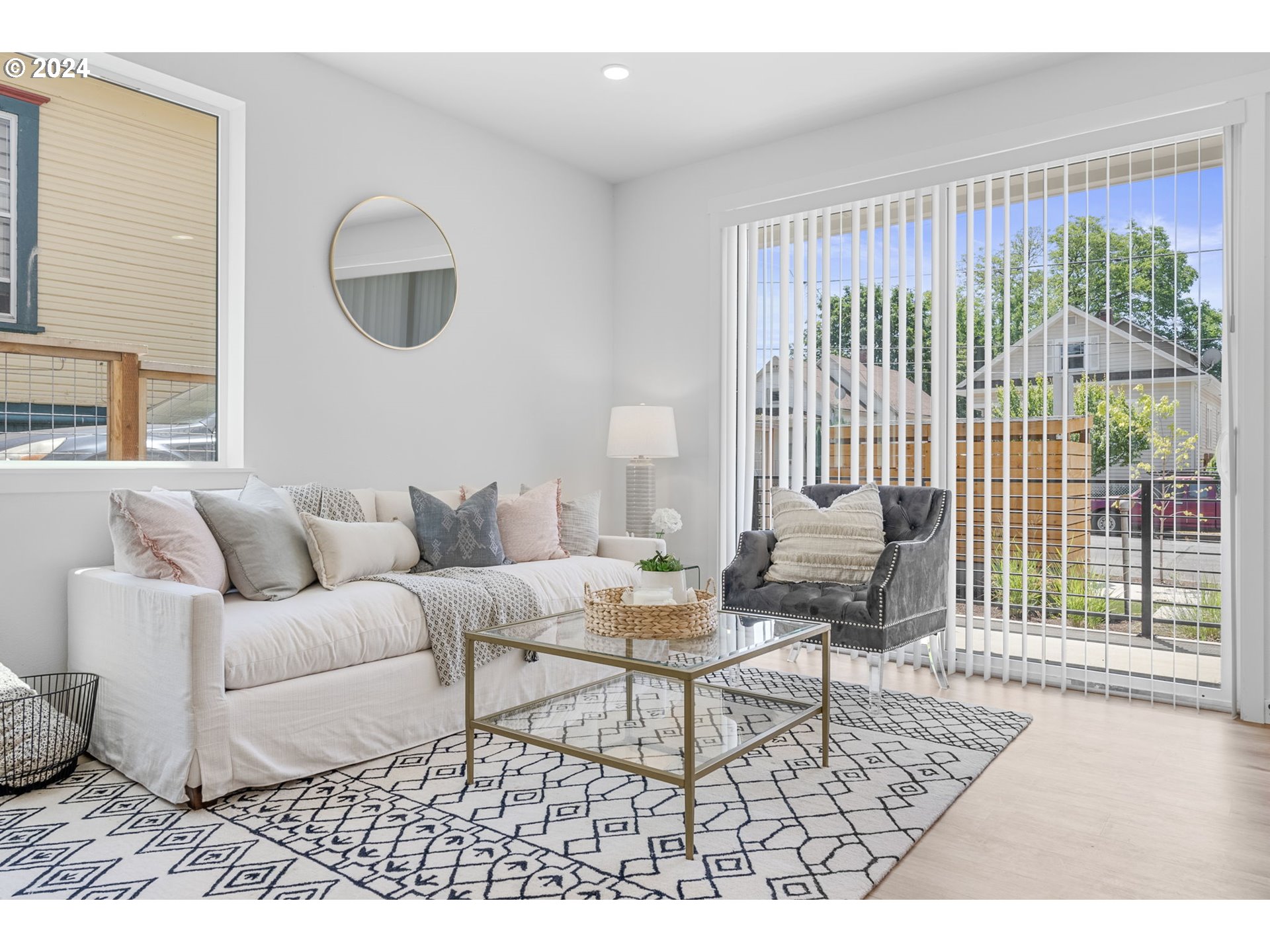 121 North Going Street, Unit 202 Portland, OR 97217 - Photo 21 of 30 a living room with furniture and a large window