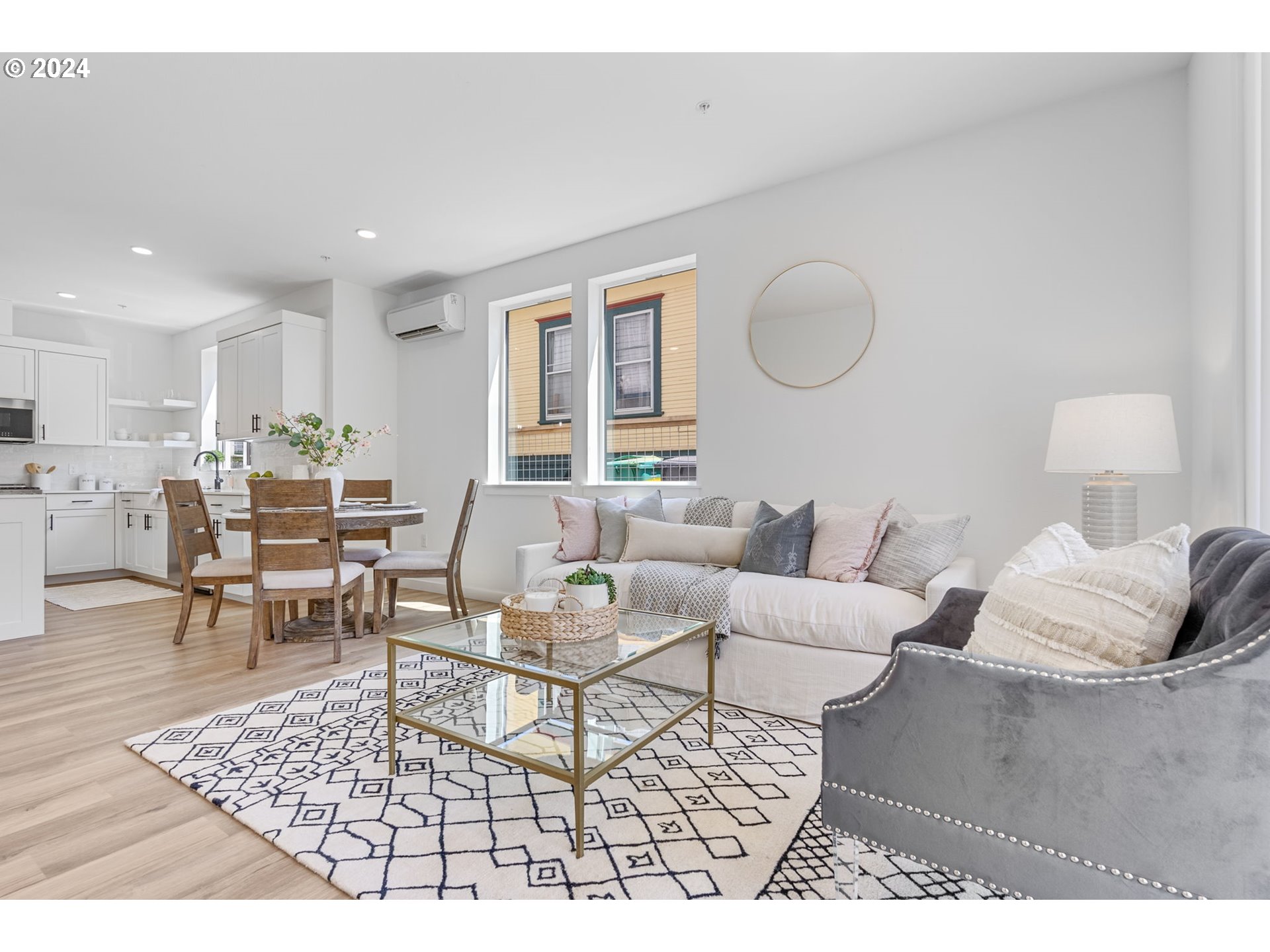 121 North Going Street, Unit 202 Portland, OR 97217 - Photo 26 of 30 a living room with furniture and a table