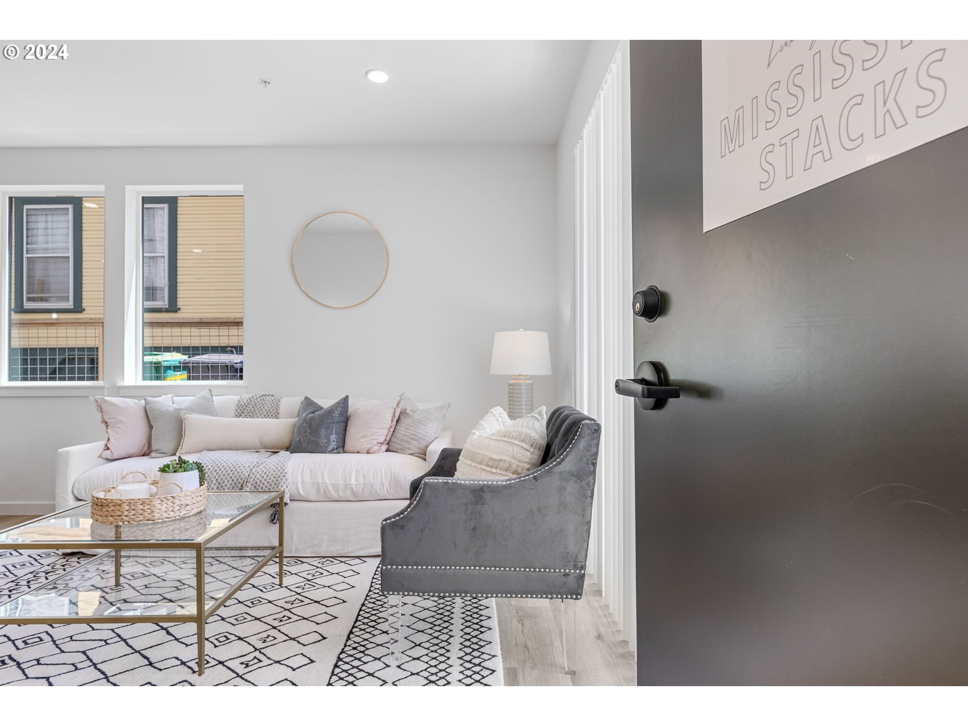 121 North Going Street, Unit 202 Portland, OR 97217 - Photo 5 of 30 a living room with furniture and a window