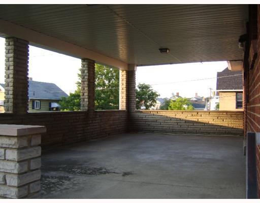 716 Irving Street Vandergrift, PA 15690 - Photo 16 of 18 Patio/Deck. Spacious covered, rear porch!