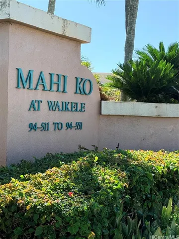 a sign that is sitting in front of a door