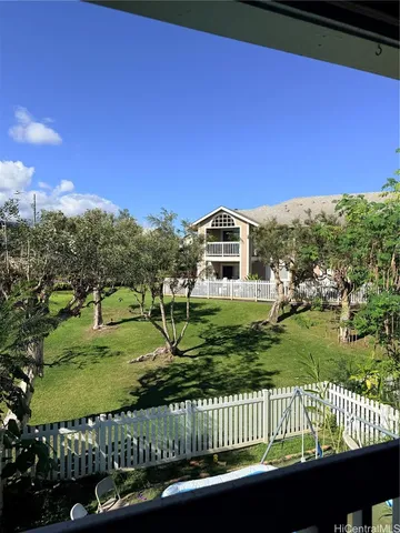 a view of a terrace with a yard