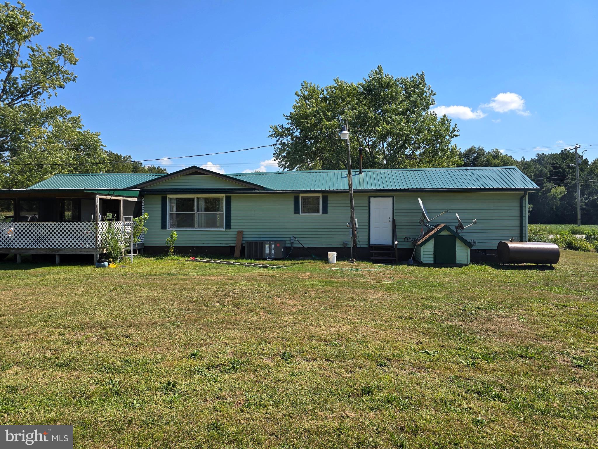 4662 Powellville Road Pittsville, MD 21850 - Photo 14 of 34 a house view with a garden space