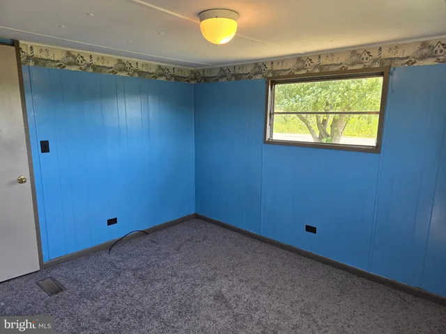 a view of a small space with a window